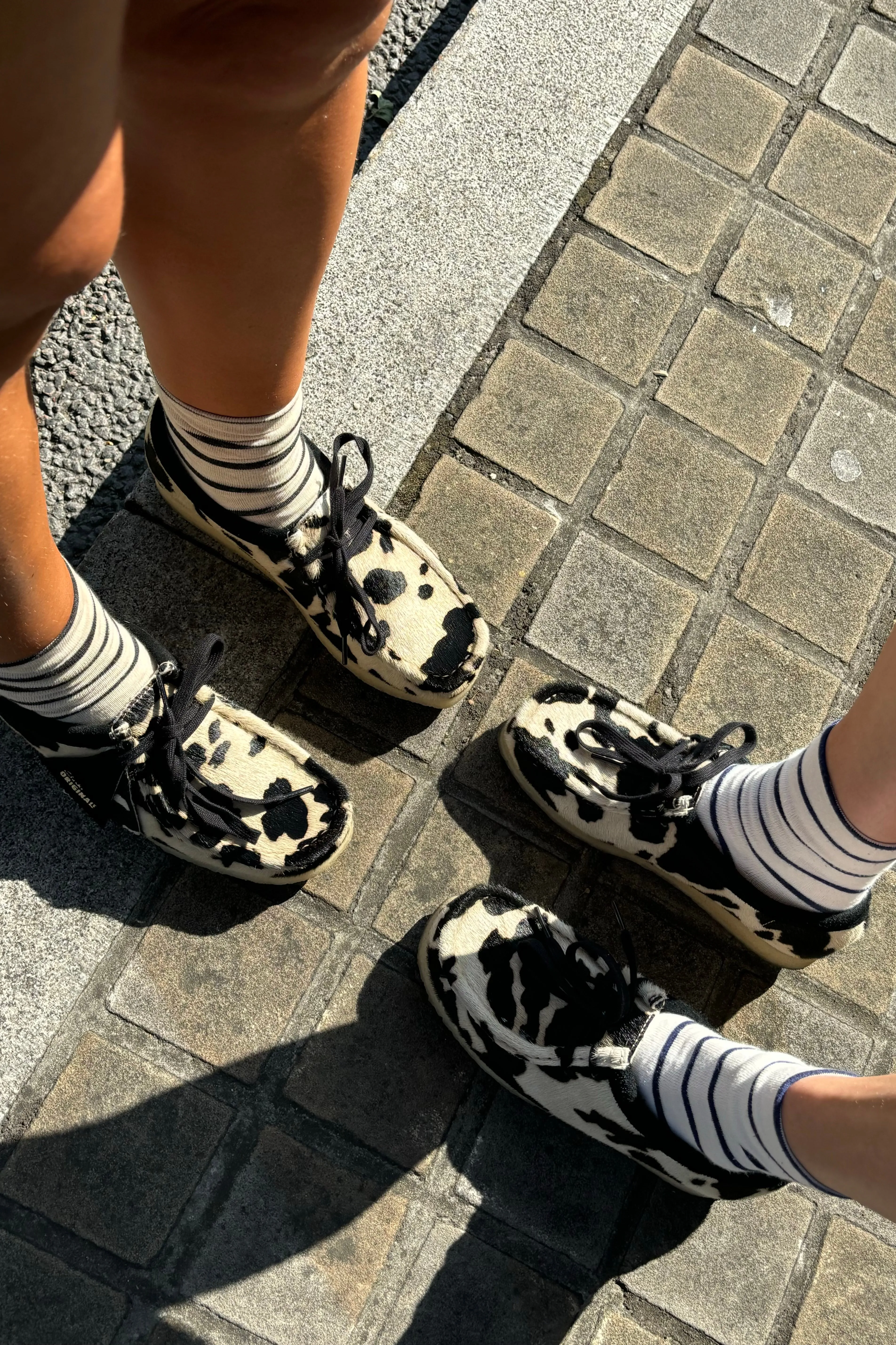 Stylish Clarks Wallabee Footwear in Unique Cow Print Design