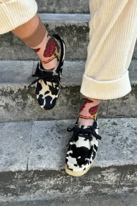 Stylish Clarks Wallabee Footwear in Unique Cow Print Design