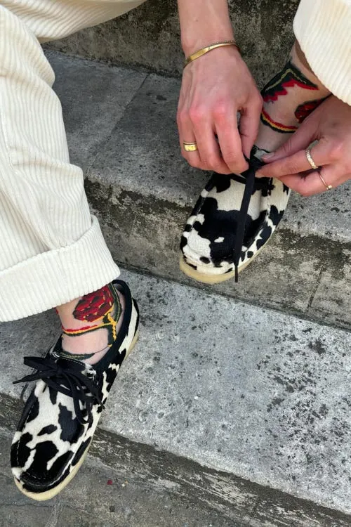 Stylish Clarks Wallabee Footwear in Unique Cow Print Design