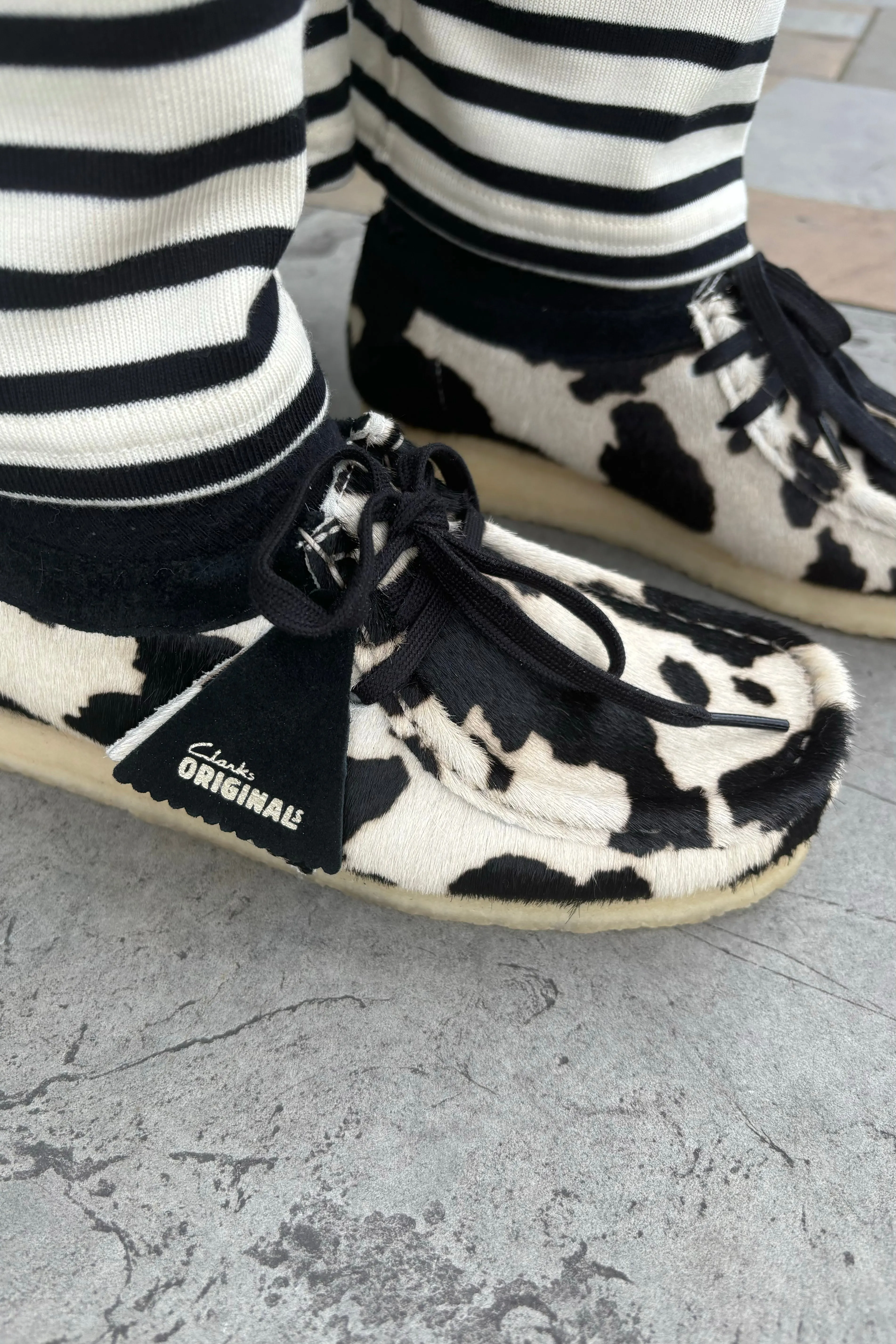 Stylish Clarks Wallabee Footwear in Unique Cow Print Design