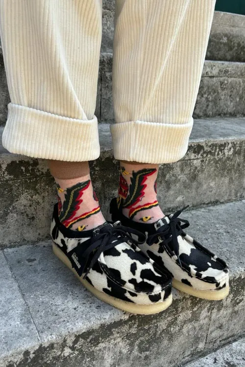 Stylish Clarks Wallabee Footwear in Unique Cow Print Design